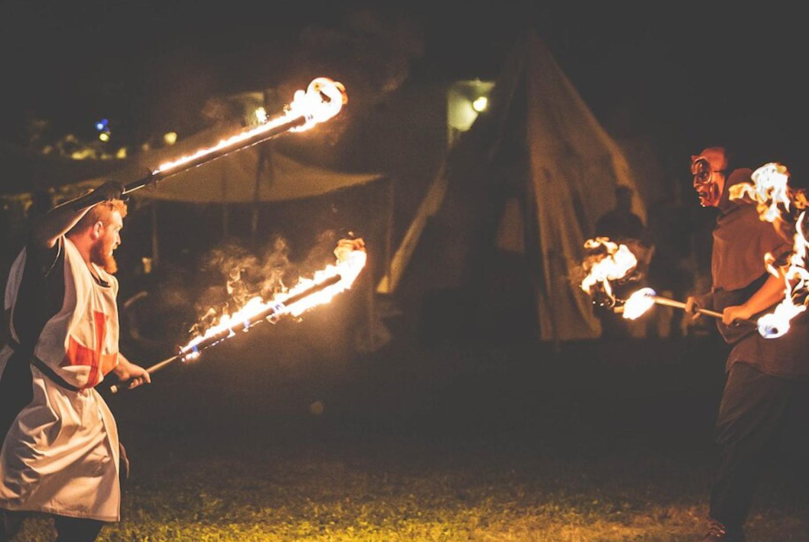 Juggling show with fire torches of the historical group "Burgo Turris"